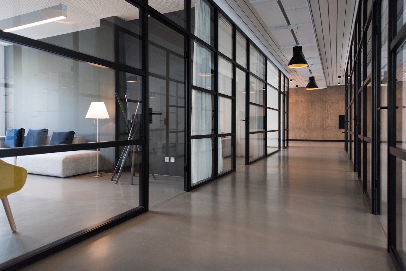Contemporary office with glass partition systems
