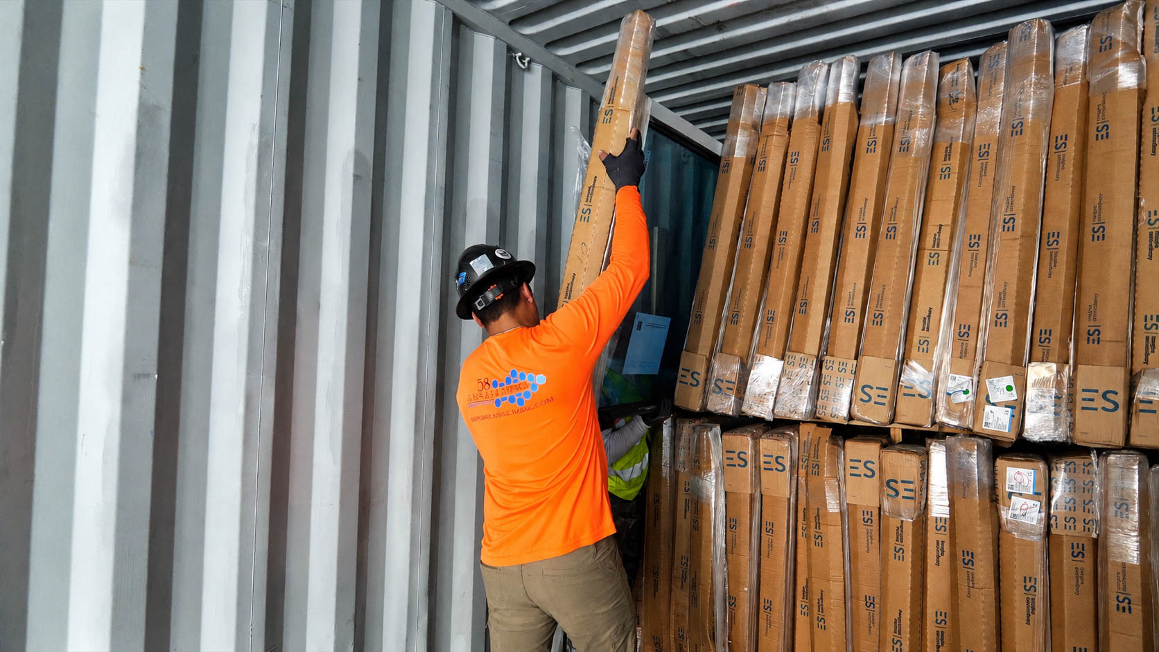 58 Glass & Glazing specialist organizing framed glass materials
